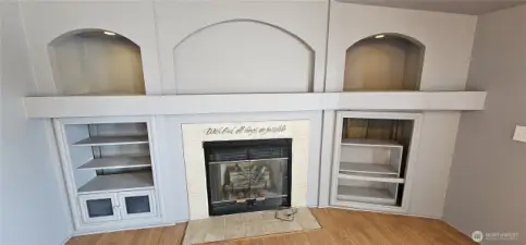 Built in bookshelves and art alcoves