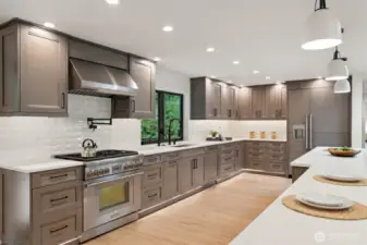 Custom kitchen with Thermador appliances. Loads of counter space and storage.