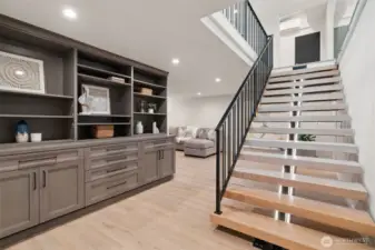 Floating staircase to lower level.