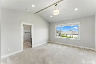Primary bedroom on the main floor, coming from the hallway
