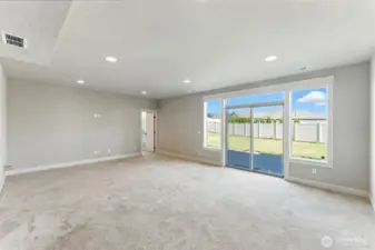 Rec room looking out onto the patio and backyard