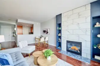 A look from the sliding door back towards the living room, dining area and kitchen. The entry door to the unit is to the left in the photo.