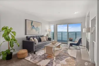 Panoramic Views from Sunrise to Sunset!  Unblockable vistas await from this immaculate 2-bed, 2-bath condo in the heart of Alki. Whether you're enjoying morning coffee or evening sunsets, the views from the open living area & primary suite are truly unforgettable. A cozy 2-sided gas fireplace brings warmth & ambiance to both spaces. Stay cool all summer w/central A/C & relax into the carefree beach lifestyle in this move-in-ready home. Just a short stroll to Alki Beach, w/ its restaurants, coffee shops, & lively pubs or hop on the nearby Downtown Water Taxi for an E-Z commute - or to catch a Mariners game! This well-maintained building features a stylish lobby, modern elevator, & is managed by a well-established HOA. Aloha from Alki!