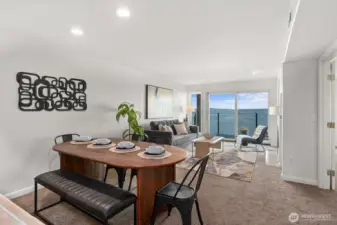 The dining area is large enough for six plus additional seating at the breakfast bar.