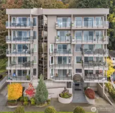 Alki Beach living at its best! Fresh exterior on the front of the building and Special Assessment is paid in full!