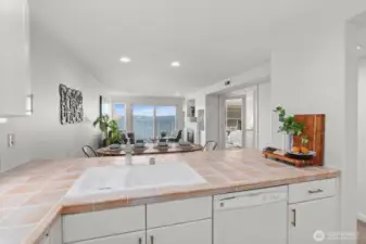 The kitchen faces the fabulous water view.