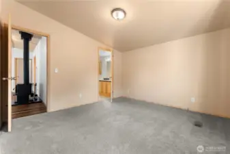 Primary suite located off of the living room.