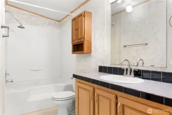 Primary bathroom includes a large soaking tub.