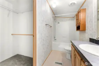 Walk in closet off of the primary bathroom.