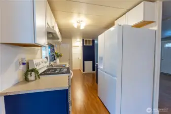 Kitchen with Timeless Finishes and full-size Refrigerator