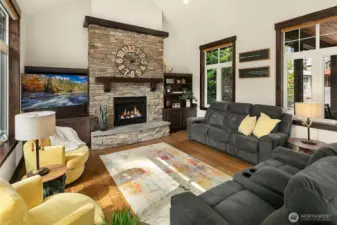 Family Room with gas Fireplace and tons of natural light!
