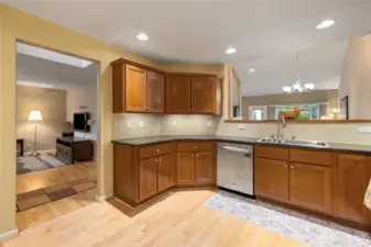 Kitchen is open to living room and dining room areas.