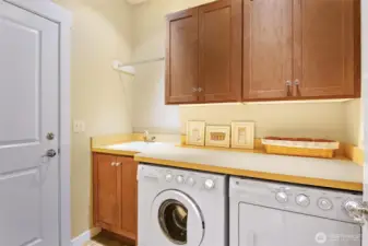 Laundry room just off from 2-car garage. Conveniently located on main floor.