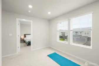 Spacious upstairs loft perfect for secondary living space, workout area, or office.