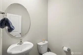 Downstairs half bath perfect for any guests