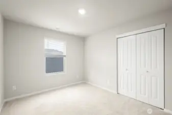 Upstairs bedroom facing side of house.