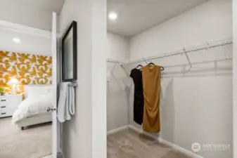 Primary walk-in lcloset. Photo is representational. Actual home is under construction. Colors, details and finishes will vary. See site agent for details.