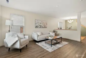 Newer Harwood Laminate Flooring in the Main Living Areas, White Faux Wood Blinds Throughout