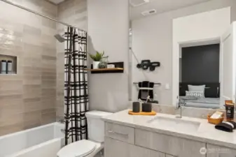 En suite bath just off 3rd bedroom.