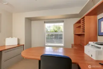 Large office with built in cabinets that all stay.