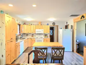 knotty pine cabinets give you lots of storage and counter eating space.
