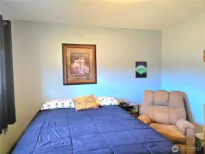 2nd bedroom . Both the 2nd & 3rd bedroom faces front of the home.