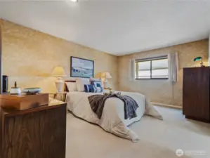 This primary bedroom will be your private retreat.