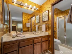 The primary bathroom is roomy.