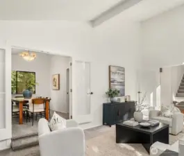 From the formal Living Room, enter into the dining room. French doors were added for additional privacy.