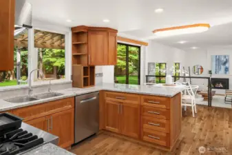 Updated by the previous owner, the kitchen offers timeless finishes.