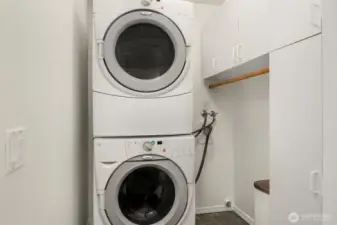 The full sized stackable washer and dryer will stay with the home.