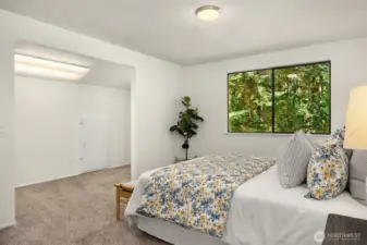 The first bedroom offers on the upper level. The large closet is great for added work space.