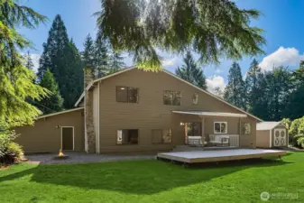 A backyard view of this stunning home. The grass has been alerted to be greener than it is today since photos were taken this Summer.