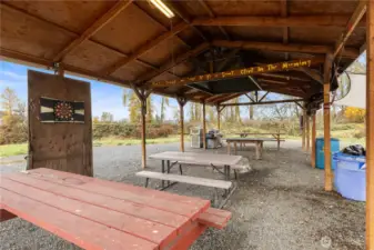 Covered structure ideal for year-round enjoyment.