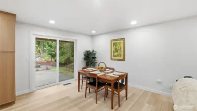 Charming dining area with slider access to the backyard for easy indoor–outdoor living.