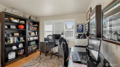 Upper-level guest room #1 with endless possibilities—perfect for guests, a home office, or whatever your lifestyle needs.