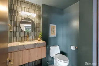 Powder room on main floor with porcelain tile from Bond Tile