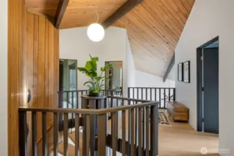 Upper floor including 3 bedrooms, 2 baths, and laundry area