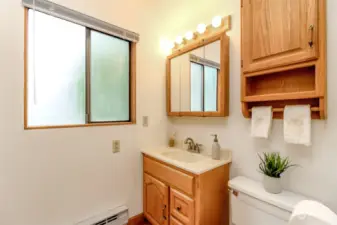 Primary bathroom has a combo tub/shower.