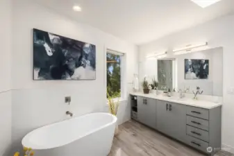 Beautiful en-suite bath with double vanities, soaking tub and separate shower.