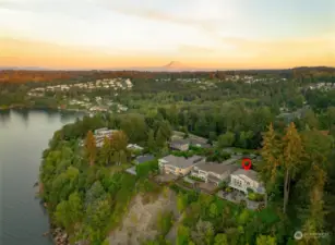 High bank waterfront ensures complete privacy and security, offering a tranquil escape from the water's edge