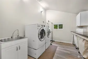 Spacious laundry room.  Downstairs off kitchen.