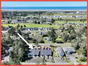 Conveniently located near town center, beach access, golf course, and lakefront park.
