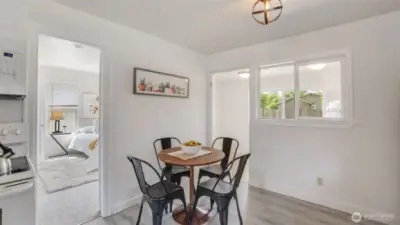Quaint dining space perfect for intimate meals and casual gatherings, offering just the right amount of room for comfortable dining