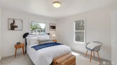 Brand-new carpeting throughout the house adds a fresh touch to both bedrooms and beyond