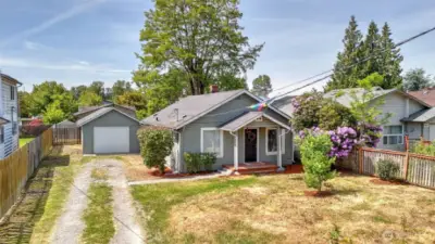 Enjoy a generously sized front yard with open space perfect for gardening and landscaping