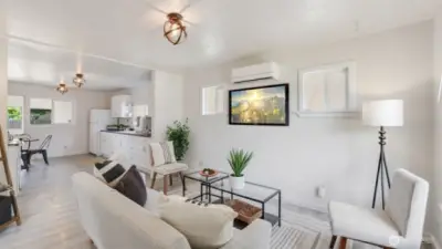 Step into an inviting open-concept living room—perfect for relaxing, entertaining, and everyday living