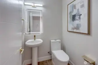 downstairs 1/2 bath (model home lot 1A, colors may vary)