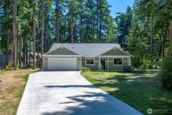 This house has it all! A hundred percent wheelchair accessible, landscaped yard, quiet neighborhood, and level, cleared nearly 1/2 acre of beautiful island living.