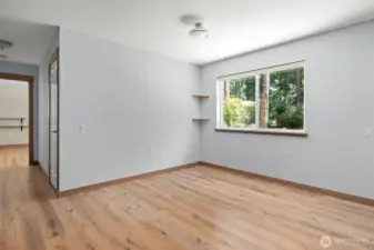 Spacious dining area, the large window draws in plenty of outdoor light.
